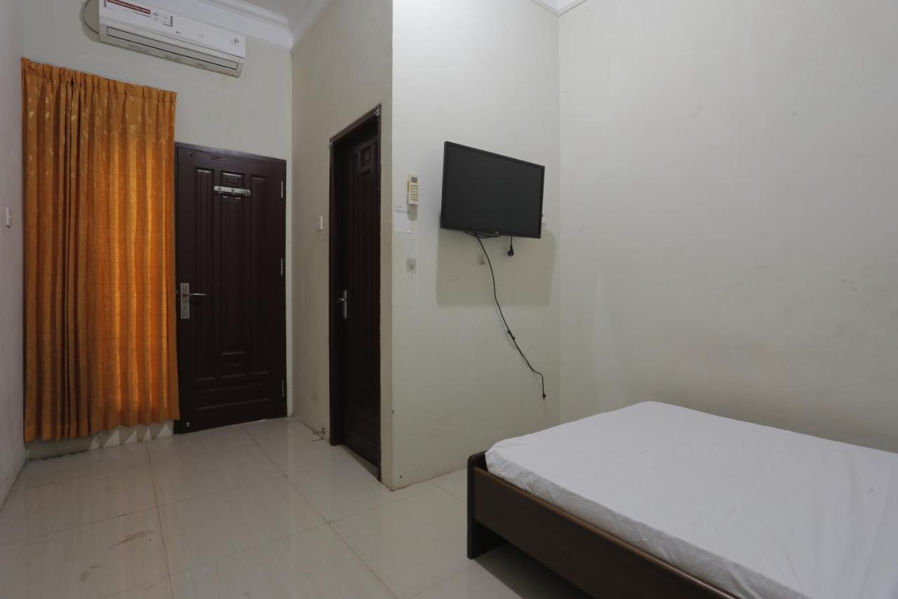 Oyo 93119 Guest House Leo Patra Muara Badak Bagian luar foto