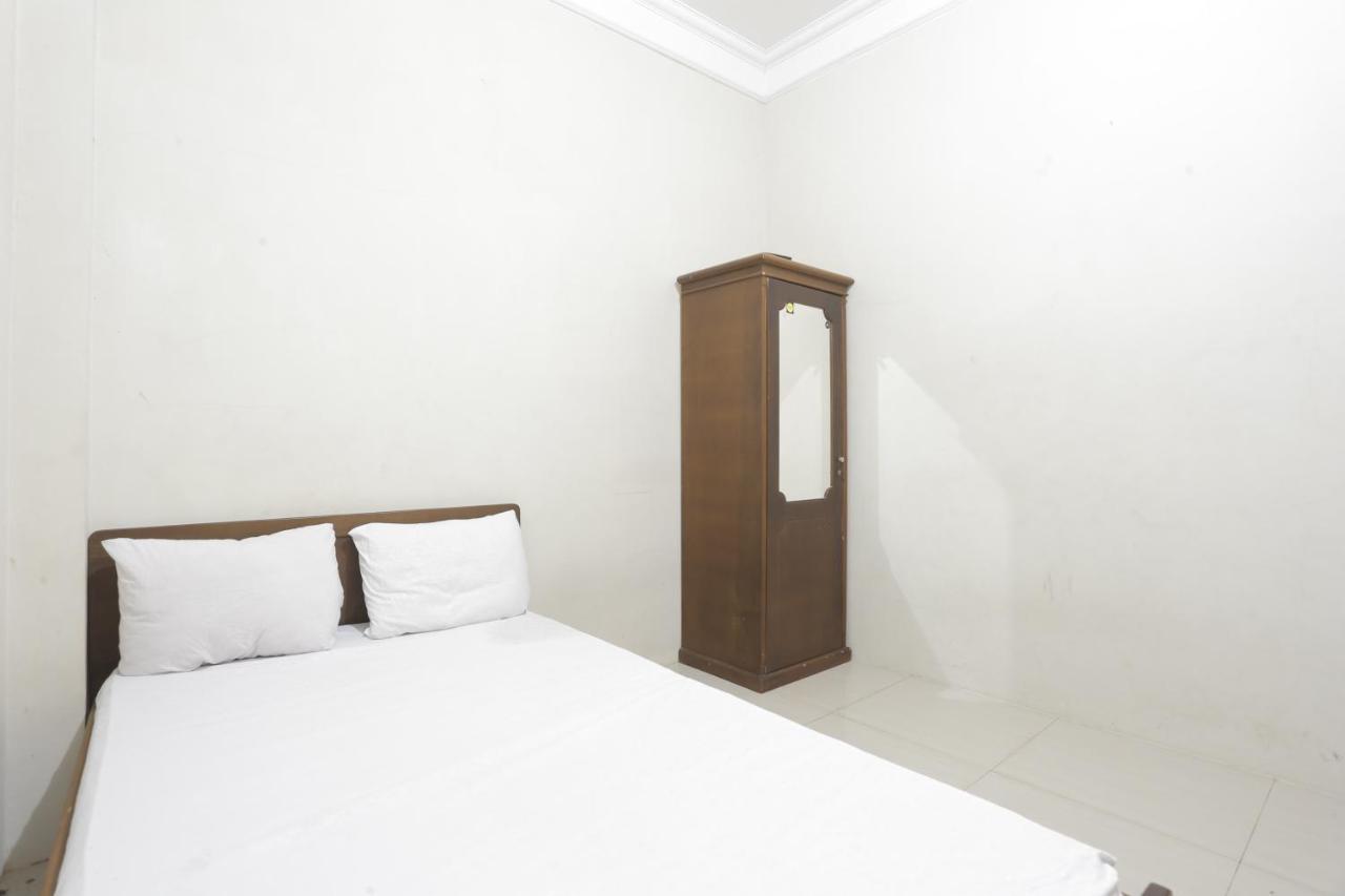 Oyo 93119 Guest House Leo Patra Muara Badak Bagian luar foto