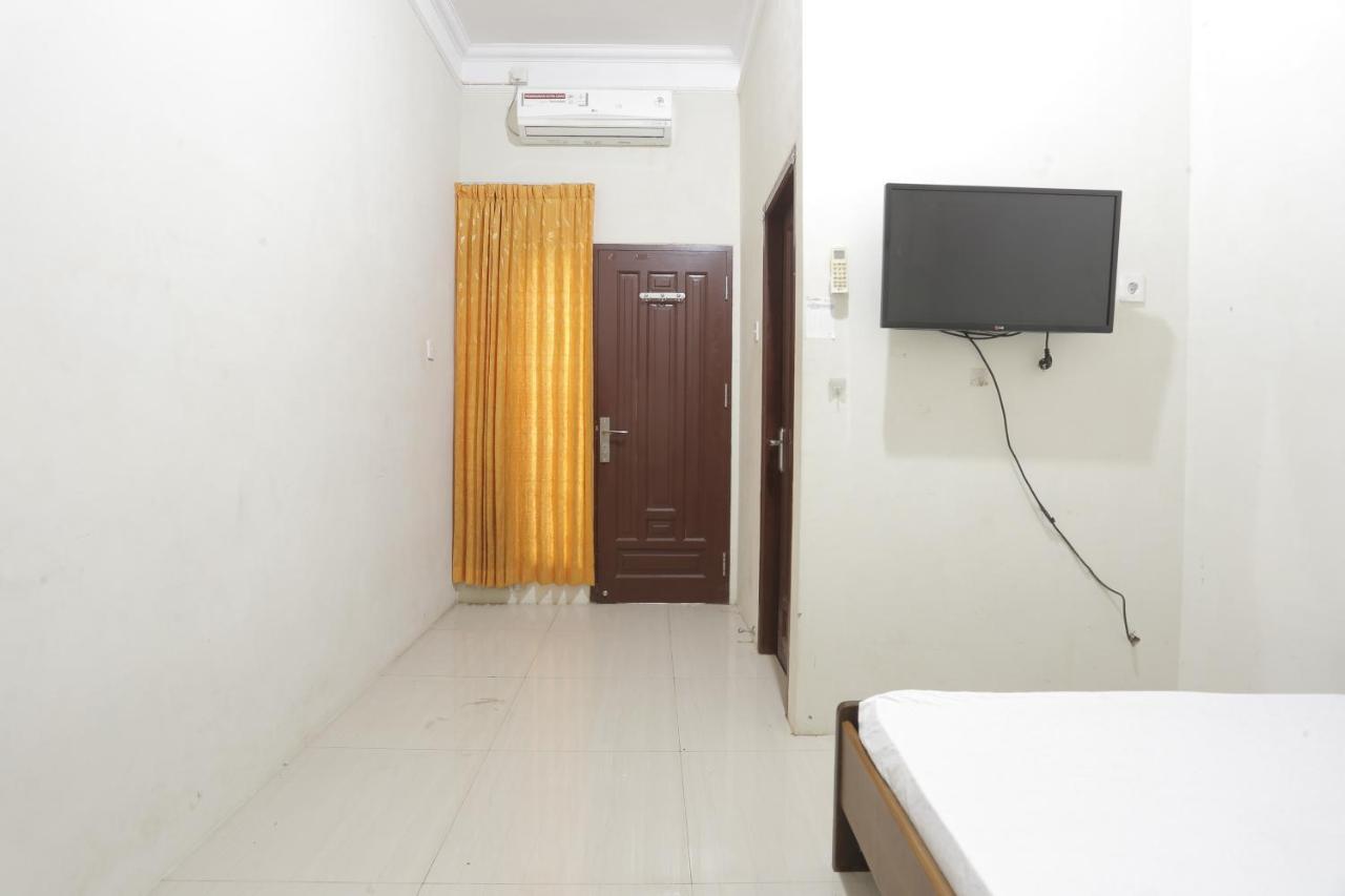 Oyo 93119 Guest House Leo Patra Muara Badak Bagian luar foto