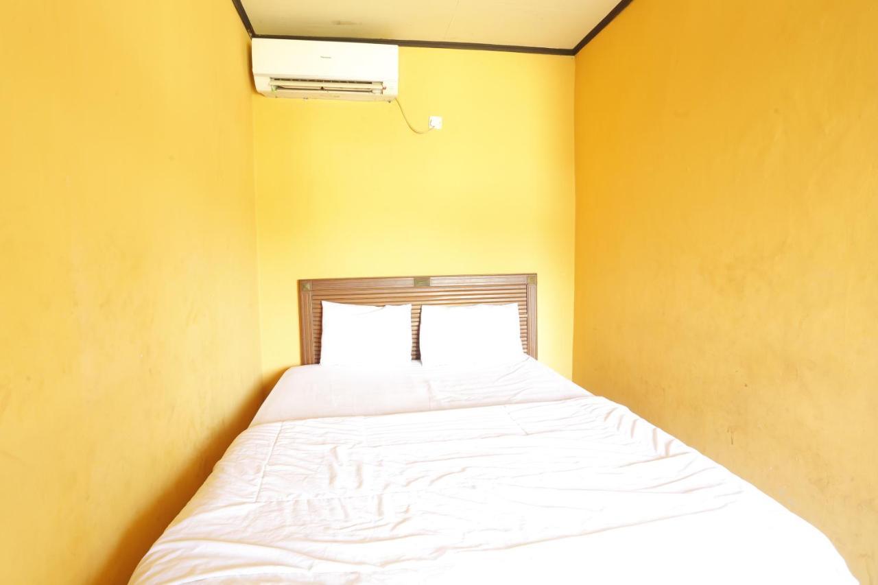 Oyo 93119 Guest House Leo Patra Muara Badak Bagian luar foto