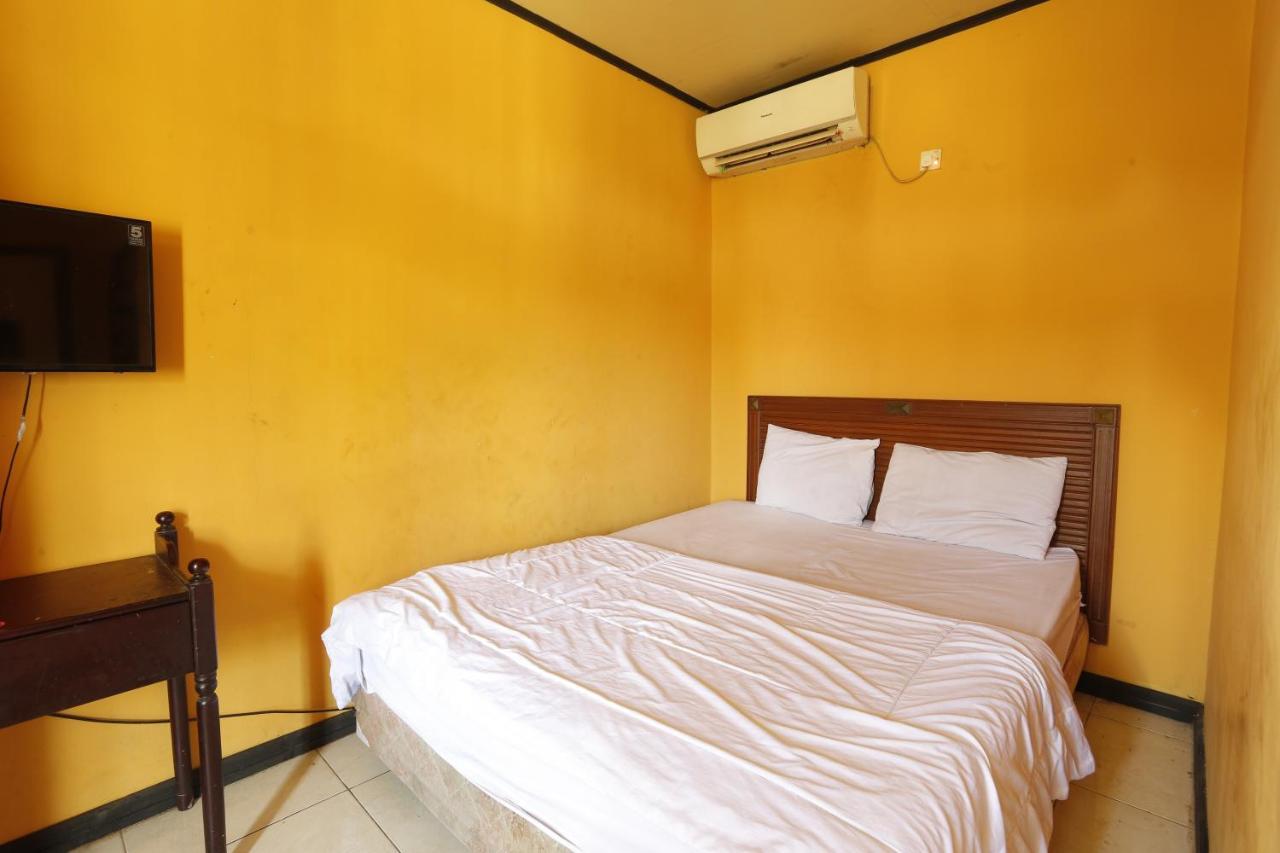 Oyo 93119 Guest House Leo Patra Muara Badak Bagian luar foto