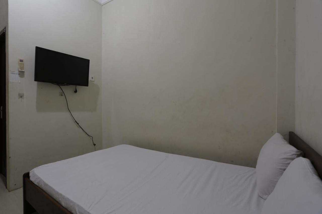 Oyo 93119 Guest House Leo Patra Muara Badak Bagian luar foto
