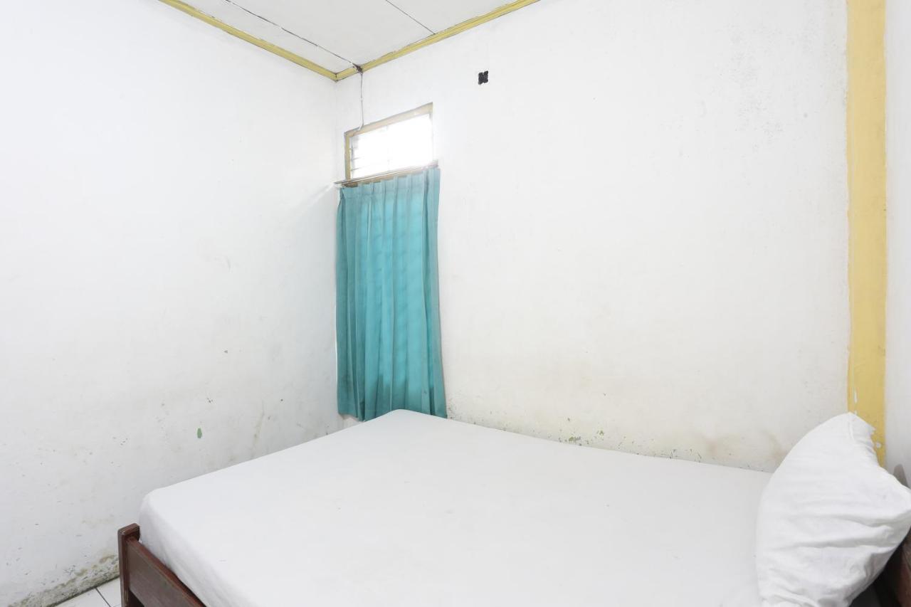 Oyo 93119 Guest House Leo Patra Muara Badak Bagian luar foto