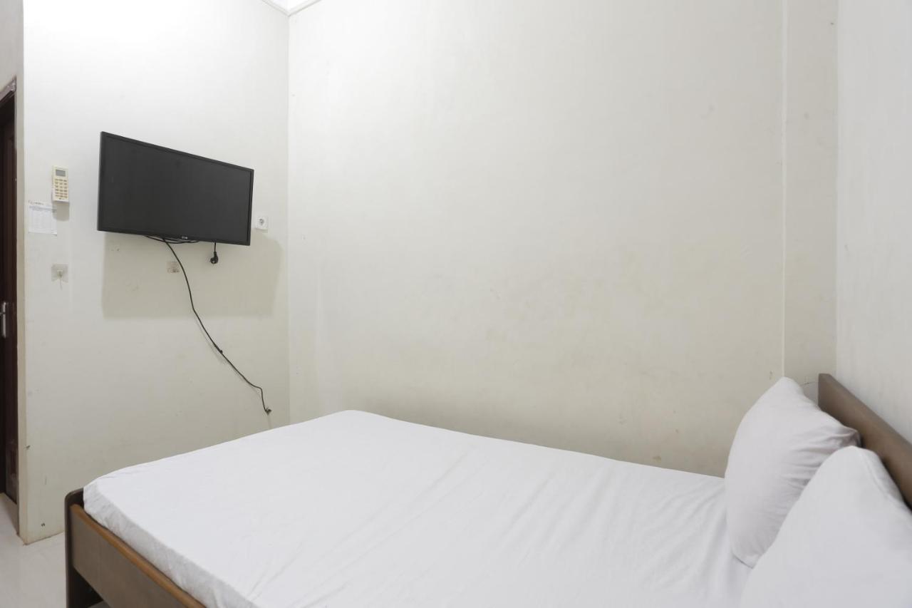 Oyo 93119 Guest House Leo Patra Muara Badak Bagian luar foto