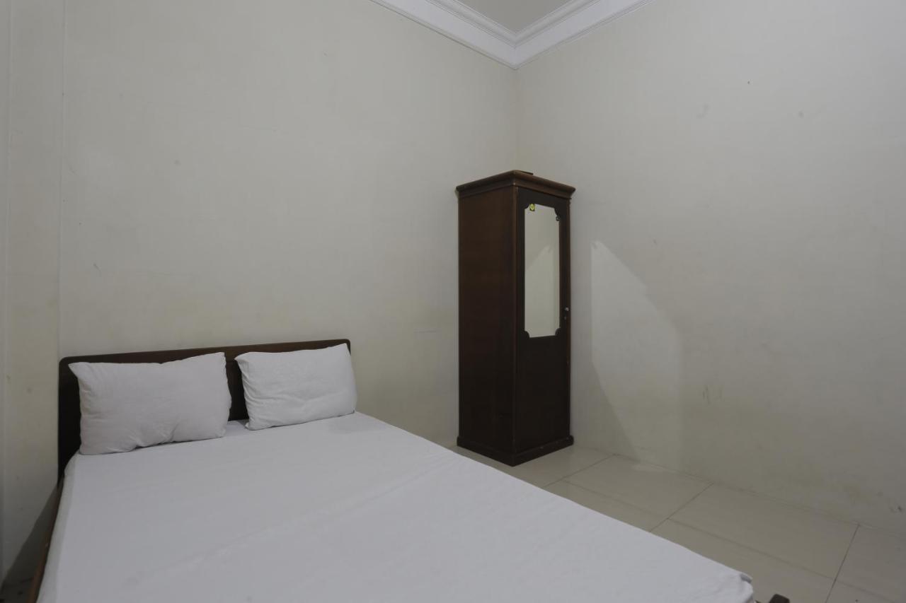 Oyo 93119 Guest House Leo Patra Muara Badak Bagian luar foto