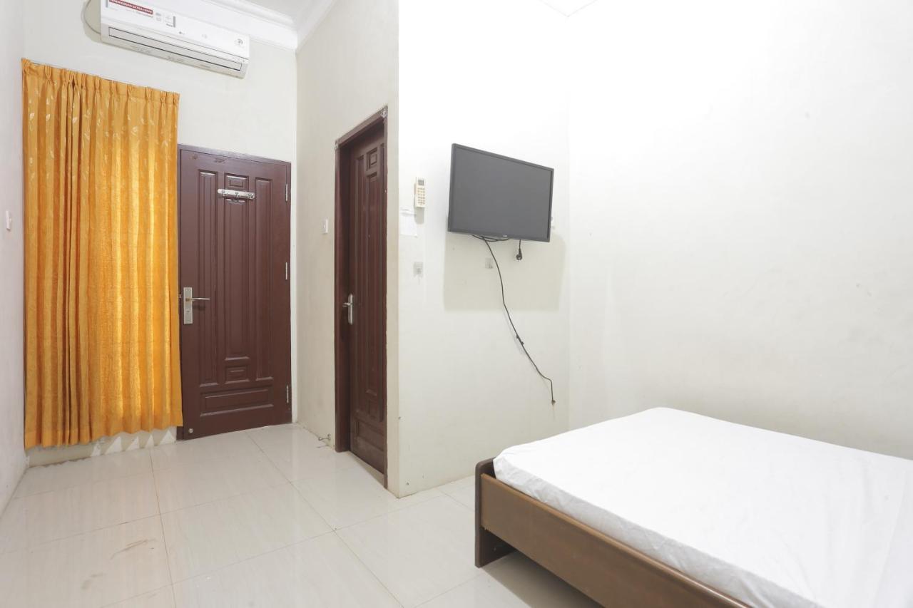 Oyo 93119 Guest House Leo Patra Muara Badak Bagian luar foto